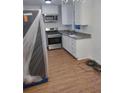 Bright kitchen featuring stainless steel appliances and ample cabinet storage at 3543 S Cobb S Dr, Smyrna, GA 30080