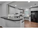 Bright kitchen with white cabinets, stainless steel appliances, and plenty of counter space at 1674 Executive Park Ne Ln, Atlanta, GA 30329