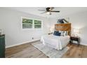 Cozy bedroom with hardwood floors, natural light, and stylish furnishings at 2519 Miriam Ln, Decatur, GA 30032