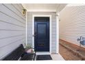Close-up of a stylish front door with elegant details and a welcoming entrance at 30 Crestfield Cir, Covington, GA 30016