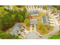 Aerial view of the townhome nestled within a tranquil cul-de-sac surrounded by lush trees at 809 Brickleridge Se Ln, Mableton, GA 30126