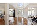 Bright foyer features gleaming hardwood floors and a soaring two-story ceiling at 2275 Barrett Dr, Cumming, GA 30040