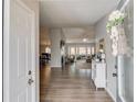 Welcoming foyer boasts beautiful wood floors and an open view of the dining and living areas at 2643 Herndon Nw Rd, Lawrenceville, GA 30043
