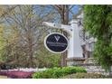 Vinings Vineyard Condominiums entrance sign with lush landscaping at 4100 Paces Se Walk # 2309, Atlanta, GA 30339