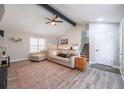Bright living room with vaulted ceilings, modern flooring, and a staircase at 4520 Jackybell Trl, Decatur, GA 30034