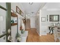 Spacious foyer with hardwood floors, coat rack, and staircase leading to the upper level at 997 Woodbury Rd, Canton, GA 30114