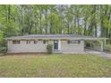 Charming single-story brick home with a carport and well-maintained front yard at 2184 Pemberton Sw Rd, Atlanta, GA 30331