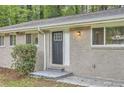 Close-up of the front door of the brick home at 2184 Pemberton Sw Rd, Atlanta, GA 30331