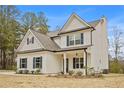 Beautiful home exterior featuring a well-manicured lawn and inviting curb appeal at 1408 Seals Rd, Dallas, GA 30157