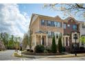 Beautiful brick townhome with manicured landscaping and covered entry on a tree lined street at 1962 Bainbridge Ln, Atlanta, GA 30345