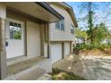 Charming home featuring a covered porch, and a two-car garage blending comfort and practicality seamlessly at 3309 Poplar Dr, Lawrenceville, GA 30044