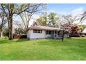 Well-maintained home exterior showcasing the landscaped yard and inviting curb appeal at 5798 Salem Rd, Covington, GA 30016