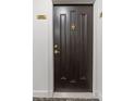 Stylish condo front door with gold accents and unit number plaque at 2870 Pharr Court South Nw # 1209, Atlanta, GA 30305