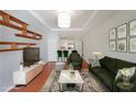 Cozy living room with modern lighting, stylish decor, and comfortable seating arrangement at 821 Ralph Mcgill Ne Blvd # 3337, Atlanta, GA 30306