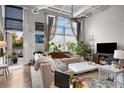 Inviting living room with lots of natural light, comfortable seating, modern decor, and an open layout at 5200 Peachtree Rd # 2116, Atlanta, GA 30341