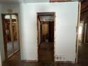Interior view of a house under renovation, showing unfinished walls at 852 Laurelmont Dr, Atlanta, GA 30311