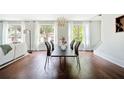 Dining area filled with natural light, a modern chandelier, and contemporary decor at 1276 Dahlgren Se Ln, Atlanta, GA 30316