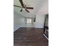 View of living room showing new flooring and sliding doors to outdoor patio or deck at 8154 Tudor Dr, Jonesboro, GA 30238