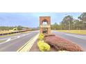 A brick entrance to Liberty Square Park at Historic Hampton at 113 Citadel Dr, Hampton, GA 30228