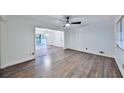 Spacious living room with hardwood floors and open access to a dining area at 570 Harris Sw Ct, Marietta, GA 30060