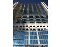 Upward view of a tall building with modern glass facade, showcases the buildings height and modern design at 3324 Peachtree Ne Rd # 1010, Atlanta, GA 30326