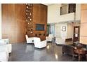 Well-designed common area with comfortable seating, wood paneling, and natural light, perfect for socializing at 3324 Peachtree Ne Rd # 1010, Atlanta, GA 30326