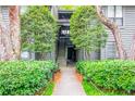 Charming condo exterior shows entryway with stairs leading to upper units at 1207 Mcclelen Way, Decatur, GA 30033