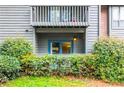 Condo exterior features private balcony and sliding glass doors at 1207 Mcclelen Way, Decatur, GA 30033