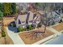 Beautiful home featuring manicured landscaping, a long driveway, and a well-maintained lawn at 4155 Cami Way, Buford, GA 30519