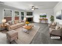 Bright and airy living room featuring a fireplace, ceiling fan, and neutral decor at 2910 Blake Towers Ln, Buford, GA 30519