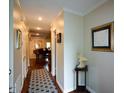 Hallway with hardwood floors leading to the living and dining area at 3259 Clairmont North Ne, Brookhaven, GA 30329