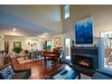 Open concept living area with fireplace, hardwood floors, and natural light at 3259 Clairmont North Ne, Brookhaven, GA 30329