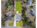 Aerial view of the property showcasing the layout of the home and surrounding landscape at 3991 Centennial Trl, Duluth, GA 30096