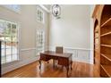 Bright office with hardwood floors, built-in bookcase, and large windows at 535 Telford Pl, Atlanta, GA 30342