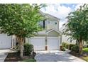 Inviting two-story home with an attached two-car garage and well-maintained landscaping at 246 Cavendar Way # 16, Marietta, GA 30066