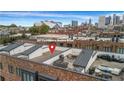 Modern rooftop deck with outdoor seating and city views, perfect for entertaining or relaxing under the Atlanta skyline at 267 Castleberry Station Sw Dr, Atlanta, GA 30313