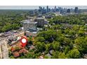 Scenic aerial view of property location near Atlanta skyline, surrounded by mature trees and with easy access to urban amenities at 8 Collier Nw Rd # B2, Atlanta, GA 30309