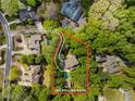 Aerial view of property at 302 Rolling Rock Rd surrounded by lush greenery at 302 Rolling Rock Se Rd, Marietta, GA 30067