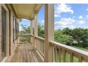 Balcony view with classic railing and picturesque view of lush greenery at 3241 Adams St, Atlanta, GA 30337