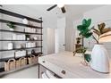 Chic home office featuring a modern desk, open shelving, and contemporary decorative accents at 2531 Astaire Ct, Atlanta, GA 30318