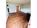 Bright living room with refinished wood floors perfect for entertaining and relaxing at 1145 Crestview Ne Cir, Conyers, GA 30012