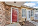 Charming front door of the home is accented by stone and a small garden at 2191 Rockbridge Rd # 501, Stone Mountain, GA 30087