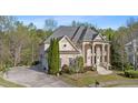 Beautiful two-story home with an attached garage and well-maintained landscaping at 4002 Moheb Sw St, Atlanta, GA 30331
