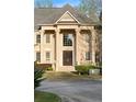Elegant two-story home showcasing an impressive front entrance with stately columns at 4002 Moheb Sw St, Atlanta, GA 30331