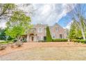 Beautiful brick home with manicured landscaping and a classic design, offering curb appeal and charm at 2281 Bransley Pl, Duluth, GA 30097