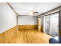 Open living room area boasting hardwood floors and natural light from a sliding door at 2442 Wentworth Ne Dr, Atlanta, GA 30345