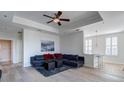 Living area featuring hardwood floors, comfortable seating, with access to the kitchen area at 325 E Paces Ferry Ne Rd # 1405, Atlanta, GA 30305
