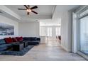 Open-concept living room boasts hardwood floors, recessed lighting, and a view into the dining area at 325 E Paces Ferry Ne Rd # 1405, Atlanta, GA 30305