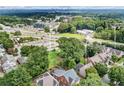 Stunning aerial view of the property showcasing neighborhood amenities and a glimpse of the downtown skyline at 4225 Maner Se St, Smyrna, GA 30080