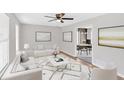 Bright living room featuring stylish decor, a modern ceiling fan, and an open layout at 111 Evergreen Trl, Cartersville, GA 30121